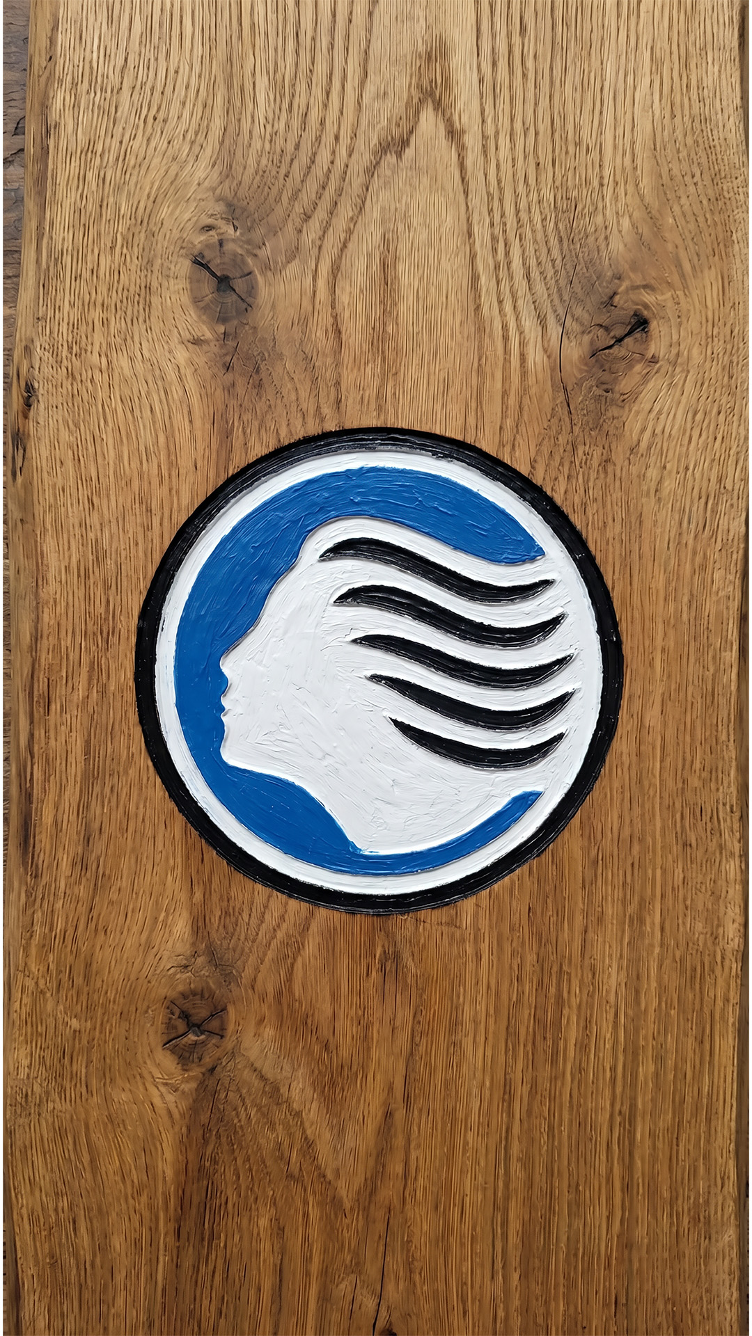 Logo storico inciso su legno